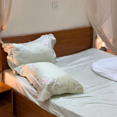 floral embroidered bedsheet set with pillow covers