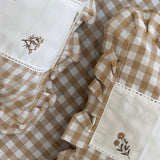 Gulmohar Brown Checkered 400 TC Pure Cotton Linen Embroidered Gingham Bedsheet | 110 X 110 inches closeup view
